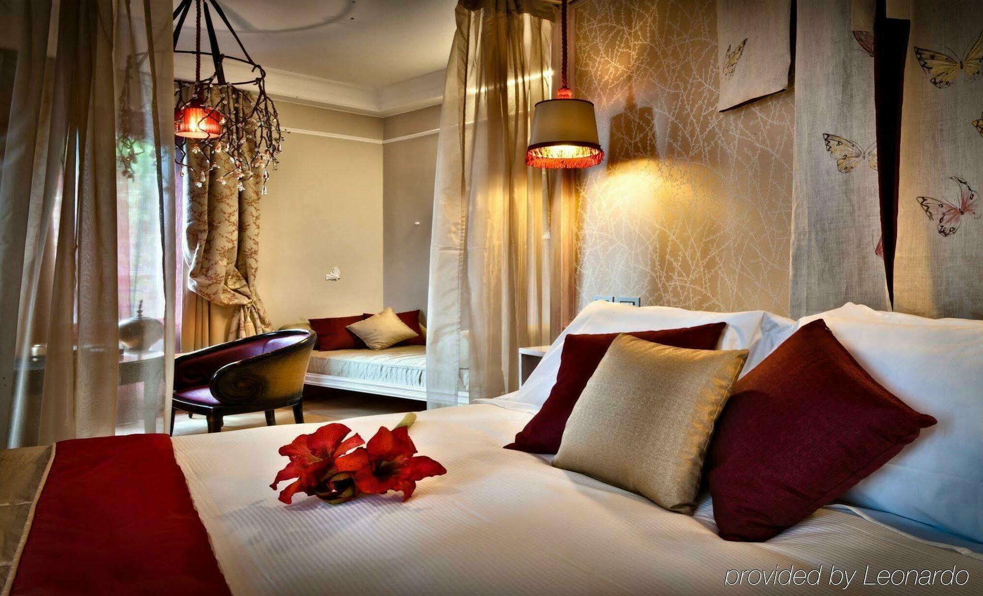 Chateau Monfort - Relais & Chateaux Milán Exterior foto A room at the hotel